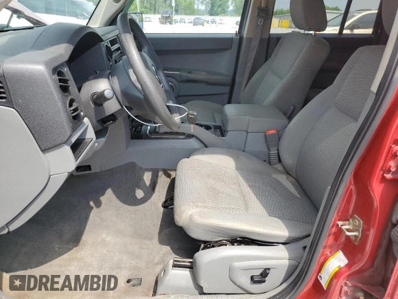 2006 Jeep Commander z VIN 1J8HG48K76C131681, wystawiony jako Copart lot #64386985 z przebiegiem 142 135 mil mil oraz Szkoda całkowita • Salvage title. Historia ofert i sprzedaży dostępna na DreamBid. Obrazek 7.