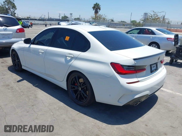2019 BMW 3 Series 330i with VIN WBA5R1C55KAJ98934, listed as a IAAI auction lot 42396379 with 65,946 mi miles and . Bid and sale history available at DreamBid. Image 3.