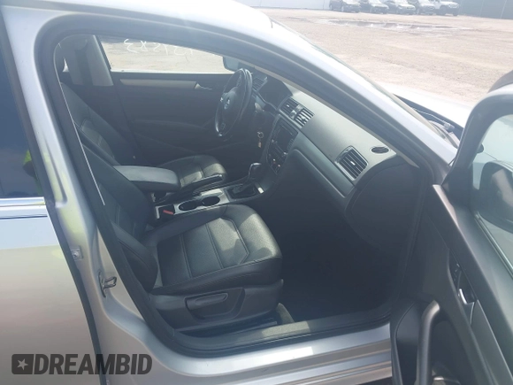 2014 Volkswagen Passat SE with VIN 1VWBT7A37EC039074, listed as a IAAI auction lot 42439583 with 109,654 mi miles and . Bid and sale history available at DreamBid. Image 5.