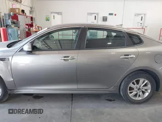 2018 Kia Optima S with VIN 5XXGT4L35JG209561, listed as a IAAI auction lot 42526577 with 161,906 mi miles and . Bid and sale history available at DreamBid. Image 14.