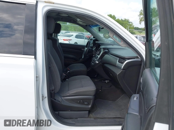 2018 Chevrolet Tahoe Commercial z VIN 1GNSKDEC8JR242164, wystawiony jako IAAI lot #42779273 z przebiegiem 134 654 mil mil oraz . Historia ofert i sprzedaży dostępna na DreamBid. Obrazek 5.