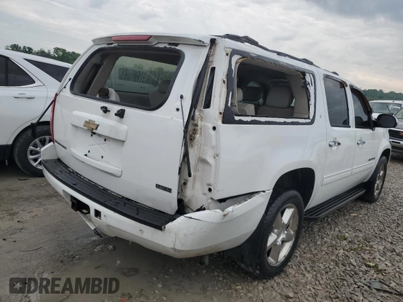 2011 Chevrolet Suburban LT with VIN 1GNSKJE3XBR392454, listed as a Copart auction lot 54828104 with 207,113 mi miles and Salvage Title. Bid and sale history available at carsss.com. Image 3.