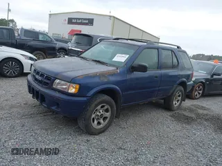 2002 Isuzu Rodeo S with VIN 4S2CK58W824315044, listed as a IAAI auction lot 41532841 with 285,951 mi miles and . Bid and sale history available at DreamBid. Image 2.