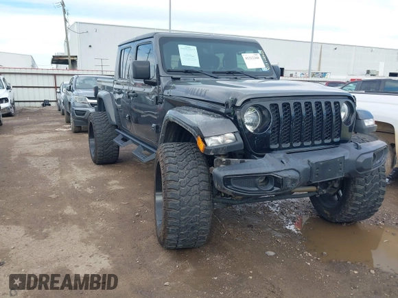 2023 Jeep Gladiator Sport S z VIN 1C6HJTAG9PL554845, wystawiony jako IAAI lot #41312360 z przebiegiem 18 077 mil mil oraz . Historia ofert i sprzedaży dostępna na DreamBid. Obrazek 1.