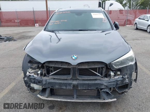 2016 BMW X1 xDrive28i with VIN WBXHT3C32GP886084, listed as a IAAI auction lot 41895754 with 85,662 mi miles and . Bid and sale history available at DreamBid. Image 6.