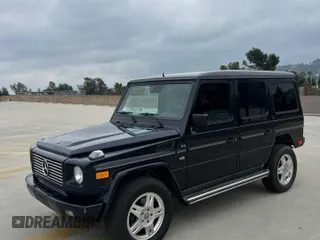 2002 Mercedes-Benz G-Class with VIN WDCYR49E72X133986, listed as a Copart auction lot 54624435 with 138,597 mi miles and Salvage Title. Bid and sale history available at carsss.com. Image 2.