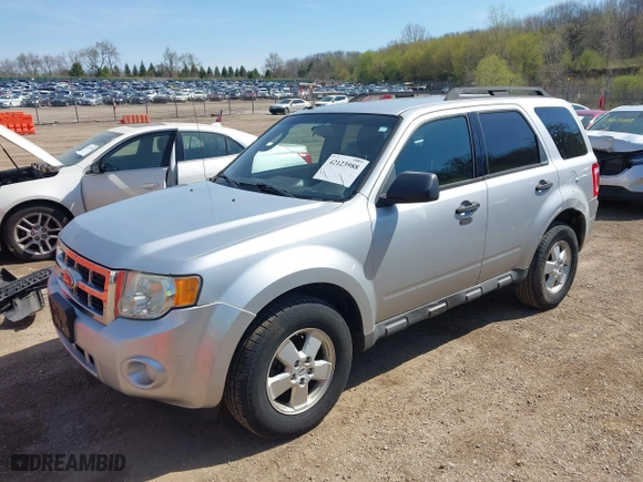 2010 Ford Escape XLT with VIN 1FMCU0D79AKB28893, listed as a IAAI auction lot 42123988 with 200,471 mi miles. Bid and sale history available at carsss.com. Image 2.