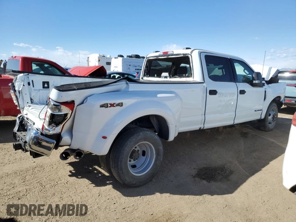 2022 Ford F-350 XL with VIN 1FT8W3DTXNEF29974, listed as a Copart auction lot 48069965 with 26,911 mi miles and Salvage Title. Bid and sale history available at DreamBid. Image 3.