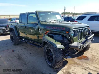2022 Jeep Gladiator Mojave with VIN 1C6JJTEG5NL110886, listed as a IAAI auction lot 41410576 with 44,307 mi miles. Bid and sale history available at carsss.com. Image 1.