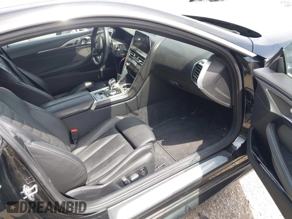 2019 BMW 8 Series M850i xDrive with VIN WBABC4C59KBU96788, listed as a IAAI auction lot 42286659 with 26,913 mi miles and . Bid and sale history available at DreamBid. Image 5.