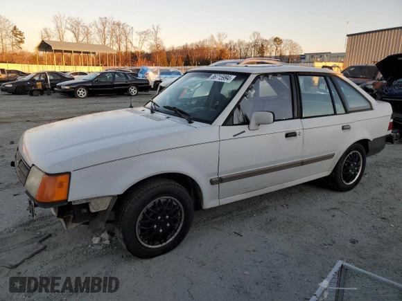 1988 Ford Escort z VIN 1FAPP959XJW370611, wystawiony jako Copart lot #86715994 z przebiegiem 3424 mil mil oraz Tytuł czysty. Historia ofert i sprzedaży dostępna na DreamBid. Obrazek 1.