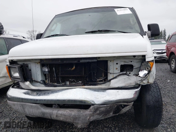 2004 Ford Econoline Cargo with VIN 1FTSS34L84HA56056, listed as a IAAI auction lot 41235862 with 215,095 mi miles and . Bid and sale history available at DreamBid. Image 12.
