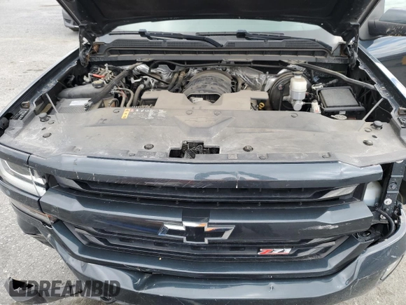 2018 Chevrolet Silverado 1500 LT with VIN 1GCUKREC4JF150646, listed as a Copart auction lot 52700405 with Not Provided miles and Salvage Title. Bid and sale history available at DreamBid. Image 11.