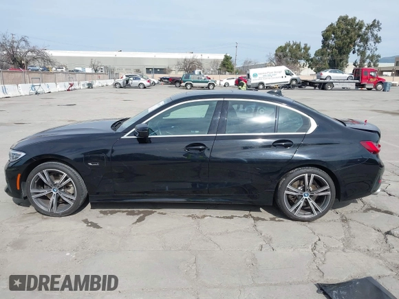 2022 BMW 3 Series 330e with VIN 3MW5P7J06N8C50460, listed as a IAAI auction lot 41688267 with 27,707 mi miles. Bid and sale history available at carsss.com. Image 14.