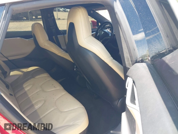 2016 Tesla Model S 90D with VIN 5YJSA1E48GF144821, listed as a IAAI auction lot 42206473 with 129,624 mi miles and . Bid and sale history available at DreamBid. Image 8.