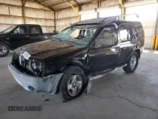 2003 Nissan Xterra XE with VIN 5N1ED28TX3C647833, listed as a Copart auction lot 63910585 with 129,221 mi miles and Salvage title. Bid and sale history available at DreamBid. Image 1.
