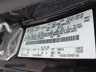 2013 Ford Escape SEL z VIN 1FMCU9H90DUC34965, wystawiony jako IAAI lot #42361165 z przebiegiem 177 387 mil mil oraz . Historia ofert i sprzedaży dostępna na DreamBid. Obrazek 9.