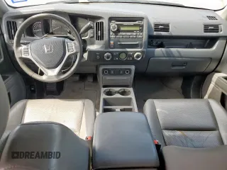 2014 Honda Ridgeline RTL z VIN 5FPYK1F53EB004694, wystawiony jako Copart lot #57222085 z przebiegiem 128 210 mil mil oraz Szkoda całkowita • Salvage title. Historia ofert i sprzedaży dostępna na DreamBid. Obrazek 8.