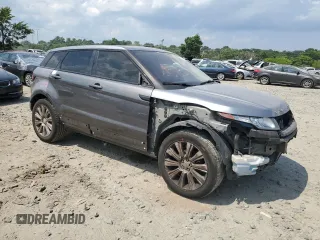 2014 Land Rover Range Rover Evoque Prestige Premium with VIN SALVV2BG5EH950921, listed as a Copart auction lot 57574564 with 151,449 mi miles and Salvage Title. Bid and sale history available at carsss.com. Image 4.