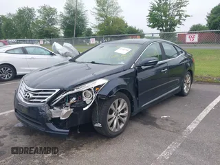 2013 Hyundai Azera with VIN KMHFG4JGXDA227569, listed as a IAAI auction lot 42384304 with 151,007 mi miles and . Bid and sale history available at DreamBid. Image 6.