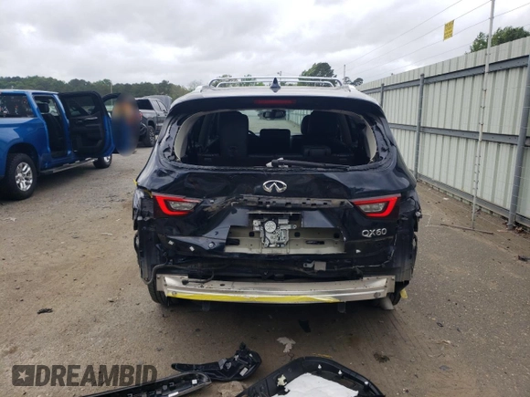 2019 Infiniti QX60 Luxe with VIN 5N1DL0MN4KC560857, listed as a Copart auction lot 52021725 with 104,013 mi miles and Salvage Title. Bid and sale history available at DreamBid. Image 6.