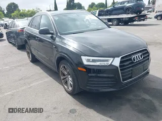 2016 Audi Q3 Prestige z VIN WA1GFCFS9GR000828, wystawiony jako IAAI lot #42454144 z przebiegiem 72 913 mil mil oraz . Historia ofert i sprzedaży dostępna na DreamBid. Obrazek 1.