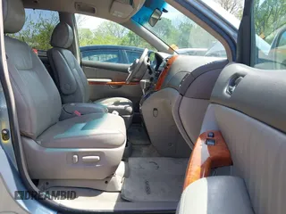 2009 Toyota Sienna XLE with VIN 5TDZK22C99S239755, listed as a IAAI auction lot 42096411 with 214,983 mi miles. Bid and sale history available at carsss.com. Image 5.