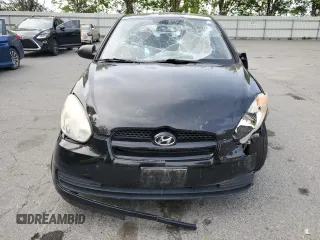 2008 Hyundai Accent GS z VIN KMHCM36C28U102887, wystawiony jako Copart lot #60717655 z przebiegiem 161 568 mil mil oraz Szkoda całkowita • Salvage title. Historia ofert i sprzedaży dostępna na DreamBid. Obrazek 5.