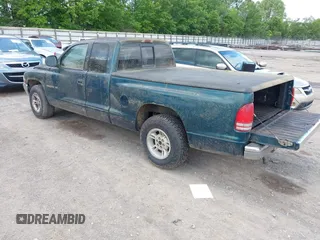 1998 Dodge Dakota SLT with VIN 1B7GL22X4WS554408, listed as a IAAI auction lot 42202021 with 147,765 mi miles. Bid and sale history available at carsss.com. Image 3.
