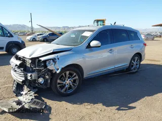 2015 Infiniti QX60 with VIN 5N1AL0MN7FC553099, listed as a IAAI auction lot 42094321 with 100,023 mi miles and . Bid and sale history available at DreamBid. Image 2.