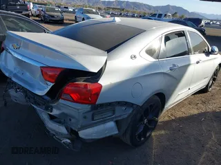 2014 Chevrolet Impala LTZ with VIN 2G1155S30E9232811, listed as a IAAI auction lot 41728281 with 106,269 mi miles and . Bid and sale history available at DreamBid. Image 4.