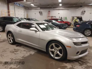 2014 Chevrolet Camaro LT z VIN 2G1FC1E31E9281774, wystawiony jako IAAI lot #41362956 z przebiegiem 144 936 mil mil oraz . Historia ofert i sprzedaży dostępna na DreamBid. Obrazek 1.