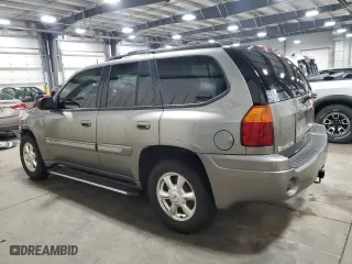 2005 GMC Envoy SLE with VIN 1GKDS13S252229262, listed as a Copart auction lot 51214685 with 117,256 mi miles and Salvage Title. Bid and sale history available at carsss.com. Image 2.