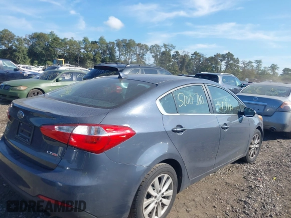 2014 Kia Forte EX with VIN KNAFX4A80E5099170, listed as a IAAI auction lot 40520284 with 172,599 mi miles. Bid and sale history available at carsss.com. Image 4.