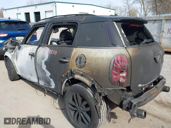 2014 MINI Countryman S with VIN WMWZC3C55EWT00416, listed as a IAAI auction lot 42031870 with Not Provided miles and . Bid and sale history available at DreamBid. Image 3.