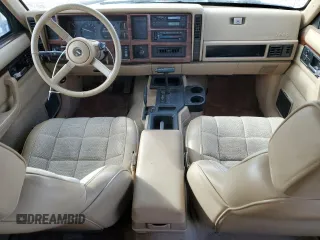 1993 Jeep Cherokee Country with VIN 1J4FJ78S8PL504126, listed as a Copart auction lot 46651035 with 153,170 mi miles and Clean Title. Bid and sale history available at carsss.com. Image 8.