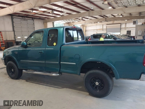 1998 Ford F-150 XL with VIN 1FTRX18L5WNB23716, listed as a IAAI auction lot 42579695 with 305,363 mi miles and . Bid and sale history available at DreamBid. Image 14.