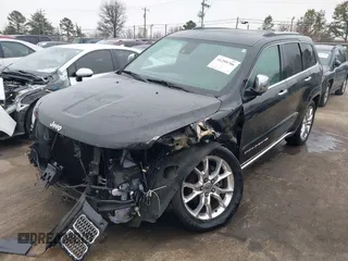 2015 Jeep Grand Cherokee Summit with VIN 1C4RJEJG3FC626002, listed as a IAAI auction lot 41295706 with 85,958 mi miles and . Bid and sale history available at DreamBid. Image 17.
