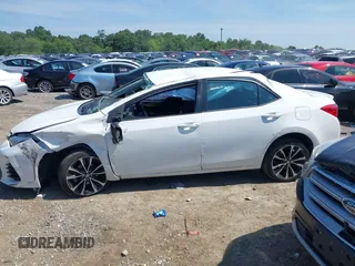 2017 Toyota Corolla L with VIN 5YFBURHE8HP689577, listed as a IAAI auction lot 42601267 with 142,853 mi miles and . Bid and sale history available at DreamBid. Image 14.