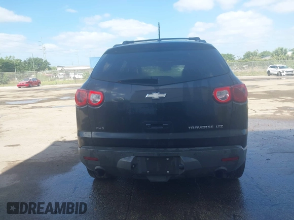 2011 Chevrolet Traverse LTZ z VIN 1GNKVLED9BJ392357, wystawiony jako IAAI lot #42155624 z przebiegiem Nie podano mil oraz . Historia ofert i sprzedaży dostępna na DreamBid. Obrazek 6.