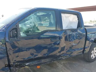 2015 Ford F-150 XLT with VIN 1FTEW1EF8FFA41487, listed as a IAAI auction lot 42573057 with 52,733 mi miles and . Bid and sale history available at DreamBid. Image 14.