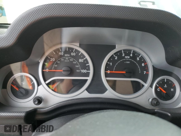 2009 Jeep Wrangler Rubicon with VIN 1J4GA64149L707142, listed as a Copart auction lot 76387344 with Not Provided miles and Salvage Title. Bid and sale history available at DreamBid. Image 9.