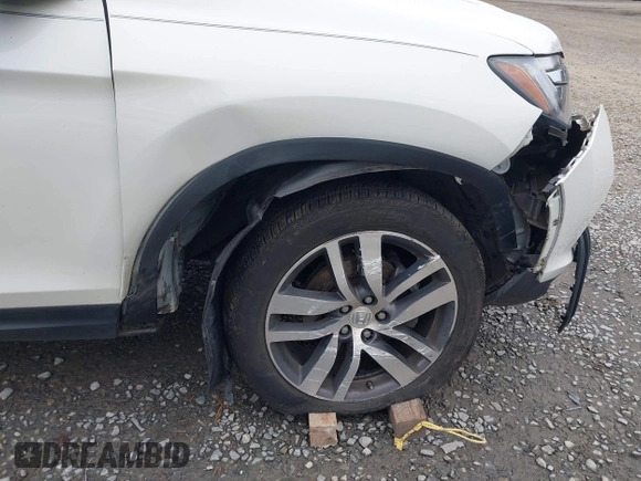 2017 Honda Pilot Elite with VIN 5FNYF6H06HB096156, listed as a IAAI auction lot 41771161 with 73,889 mi miles and . Bid and sale history available at DreamBid. Image 6.