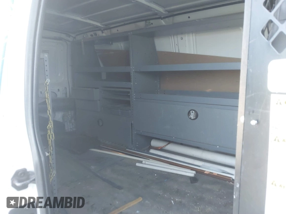 2012 Ford Econoline Cargo Commercial with VIN 1FTNE1EW4CDA80250, listed as a IAAI auction lot 41566553 with 197,626 mi miles and . Bid and sale history available at carsss.com. Image 8.