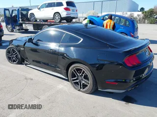 2021 Ford Mustang GT z VIN 1FA6P8CF6M5149175, wystawiony jako IAAI lot #41798328 z przebiegiem 61 776 mil mil oraz . Historia ofert i sprzedaży dostępna na DreamBid. Obrazek 3.