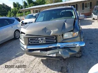 2007 Honda Ridgeline RTL z VIN 2HJYK16537H530129, wystawiony jako IAAI lot #42191209 z przebiegiem 181 686 mil mil oraz . Historia ofert i sprzedaży dostępna na DreamBid. Obrazek 6.