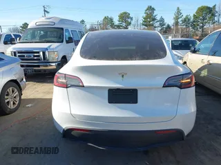 2025 Tesla Model Y Long Range with VIN 7SAYGDED9SA342374, listed as a IAAI auction lot 41663085 with 4,115 mi miles and . Bid and sale history available at DreamBid. Image 15.