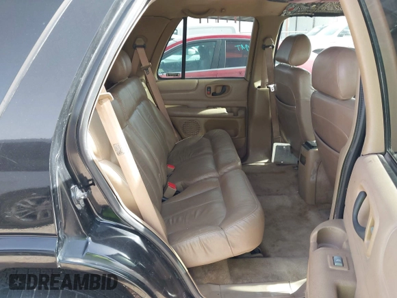 2002 Chevrolet Blazer LS z VIN 1GNDT13W42K124494, wystawiony jako IAAI lot #42266284 z przebiegiem 259 857 mil mil oraz . Historia ofert i sprzedaży dostępna na DreamBid. Obrazek 8.
