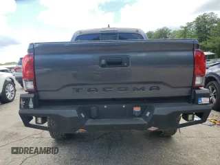 2022 Toyota Tacoma SR with VIN 3TYAX5GN2NT046114, listed as a Copart auction lot 61281875 with 57,726 mi miles and Salvage title. Bid and sale history available at DreamBid. Image 6.