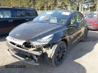 2021 Tesla Model Y Long Range with VIN 5YJYGDEE9MF301903, listed as a IAAI auction lot 42004007 with 26,740 mi miles. Bid and sale history available at carsss.com. Image 21.